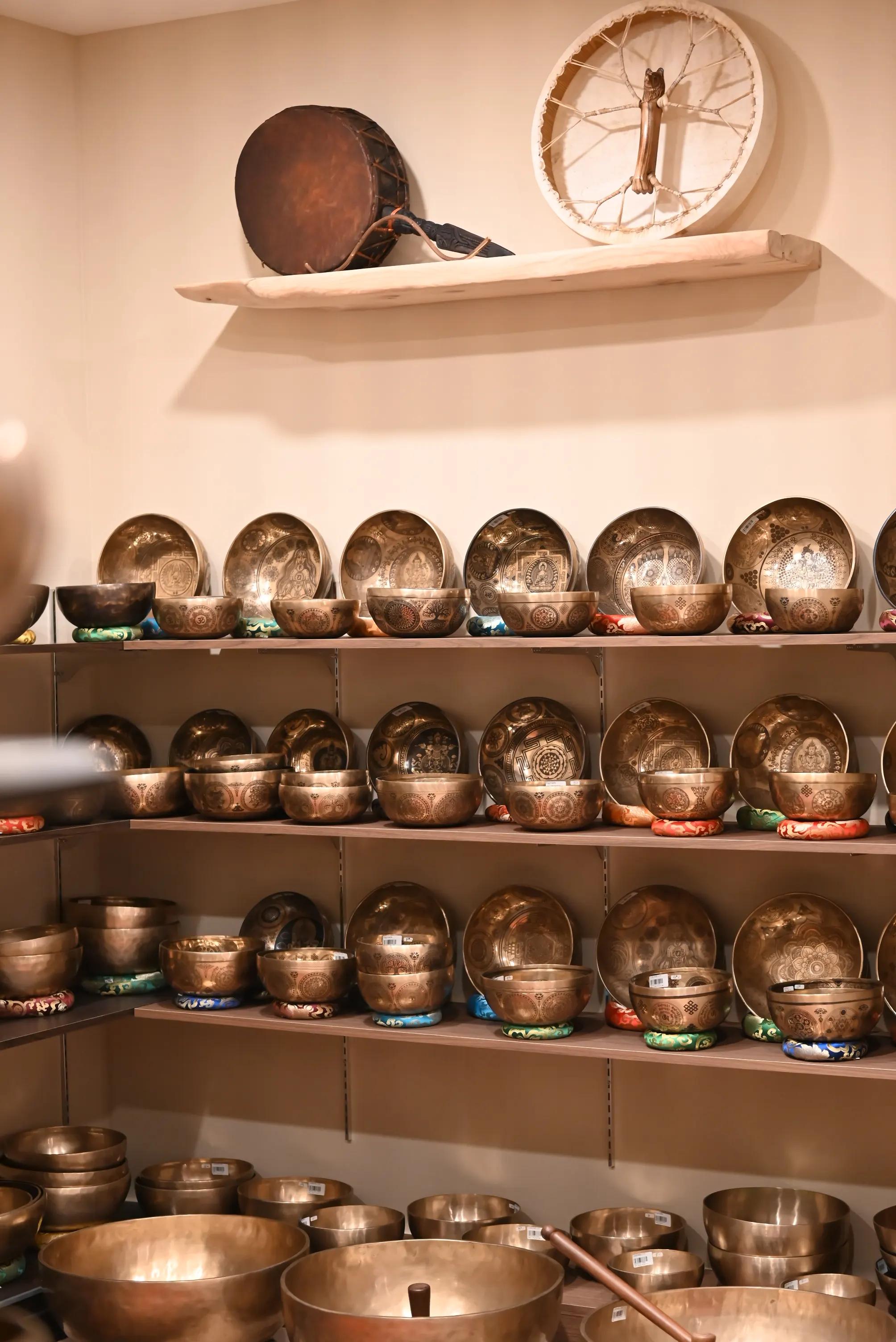 Tibetan singing bowls displayed on retail shop shelves